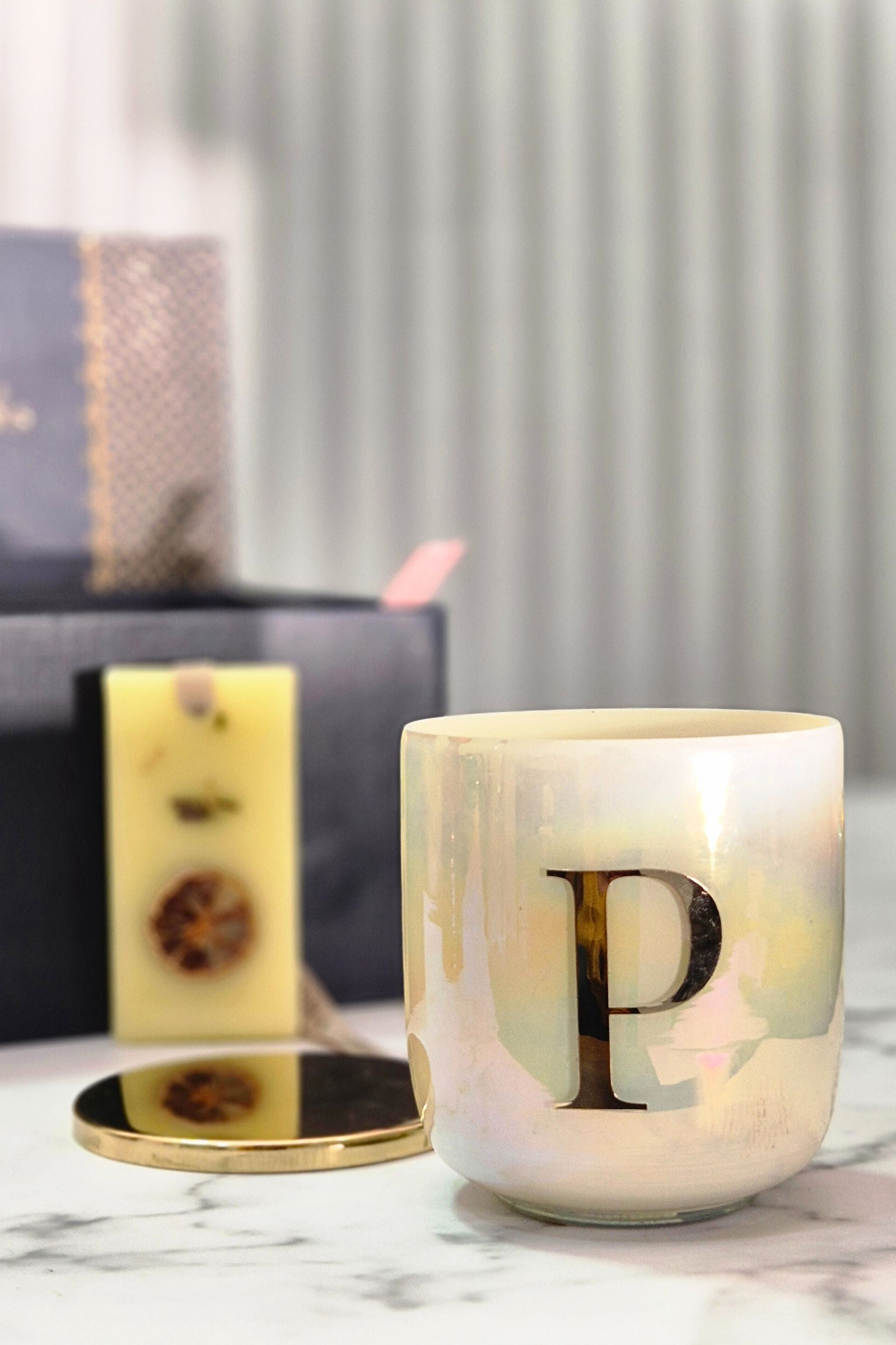 The Initial Candle + scented wax tablet