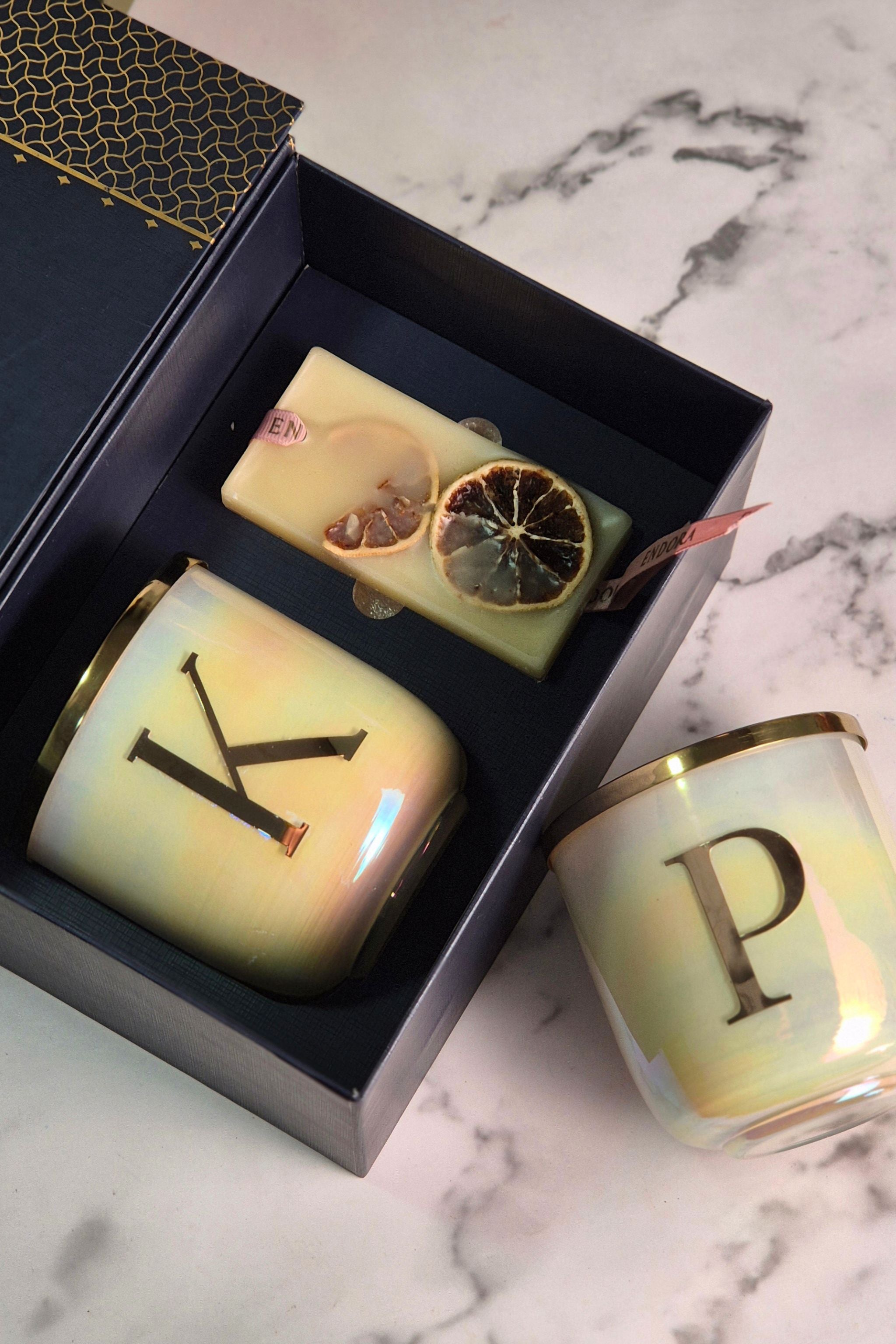 The Initial Candle + scented wax tablet